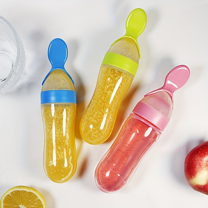 Baby Products Distributor - زجاجة سيليكون لتغذية الأطفال مع ملعقة،