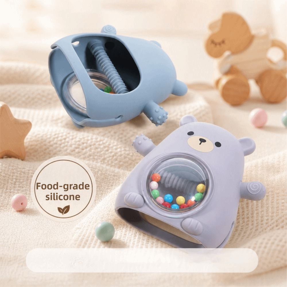 عضاضة سيليكون محمولة على شكل د - مراجعة Teething Mitten Baby وسعره